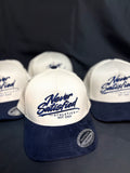 NSA CREAM AND NAVY BLUE CURSIVE SUEDE SNAPBACK.